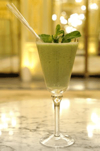 green cocktail with pepper mint leaves