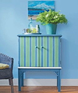 hand painted furniture for storage with striped design in blue and green colors