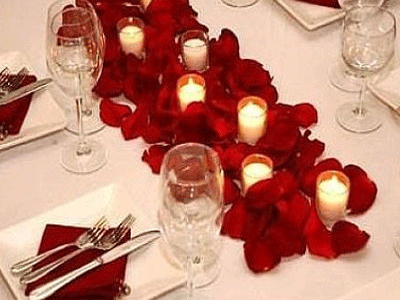 red flower and candle centerpiece idea