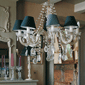 crystal chandelier with blue green lamp shades
