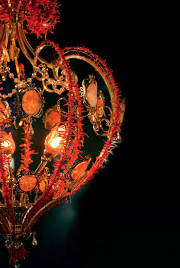 modern chandelier decorated with reef corals in red colors