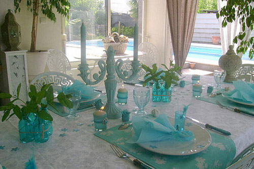 summer party table setting in white and turquoise colors