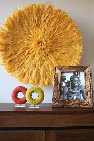 yellow juju hat for empty wall decorating