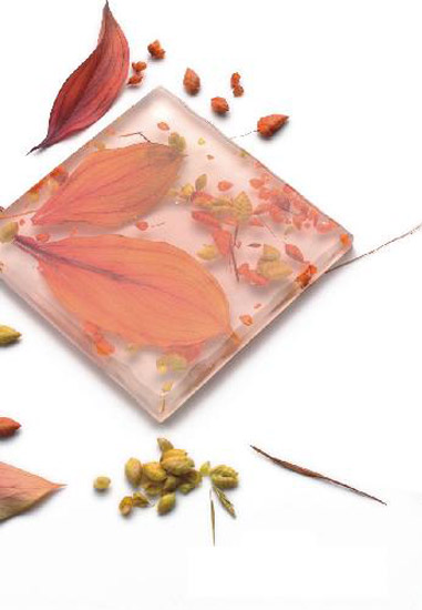 pink glass tile design with leaves