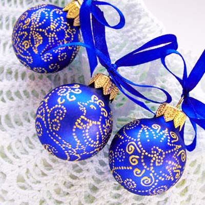 traditional chrismas balls in dark blue, white and golden colors