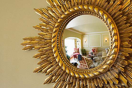 golden mirror frame on the wall for modern interior decorating