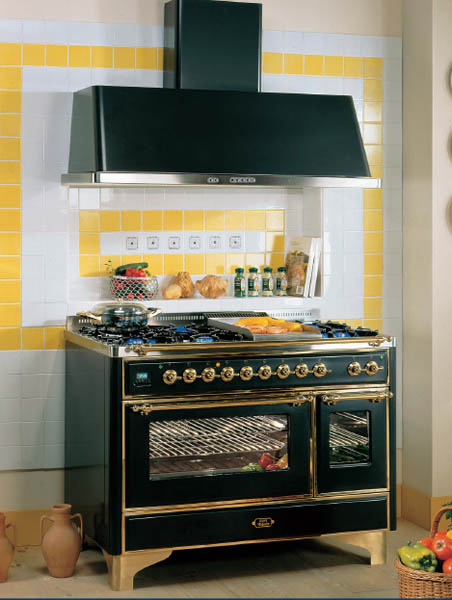 black retro kitchen stove and yellow wall tiles