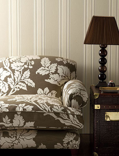light gray striped wallpaper and floral upholstery fabric