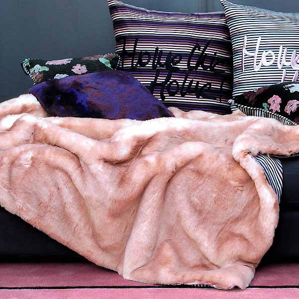 faux fur blanket in soft pink color