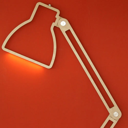 designer light on red wall