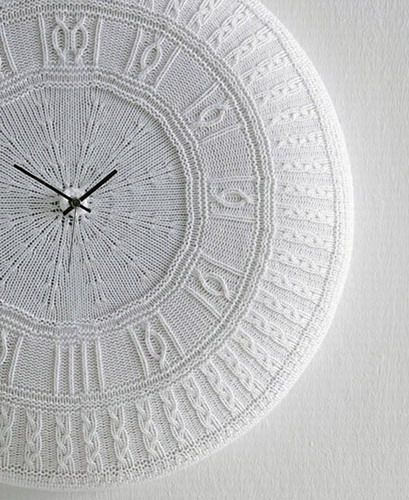 white wall clock with knitted cover