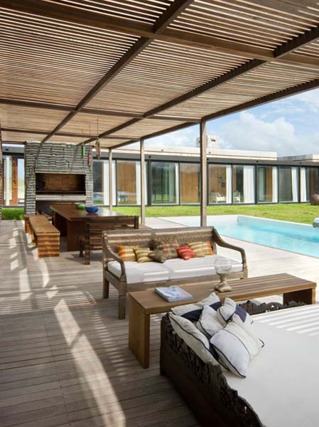 outdoor rooms with wooden ceiling and pool