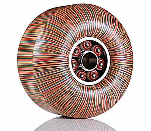 colorful wheel sculpture made of old skateboards