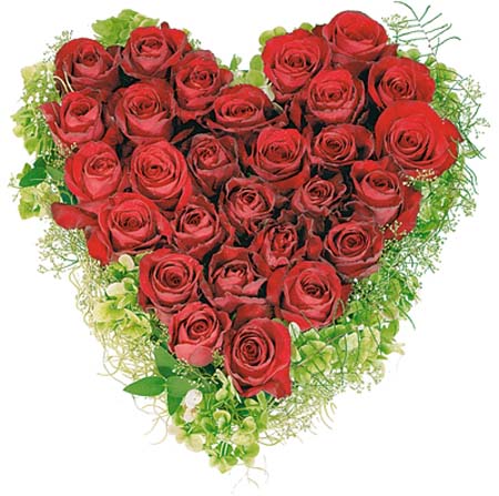 heart shaped floral arrangement with red roses