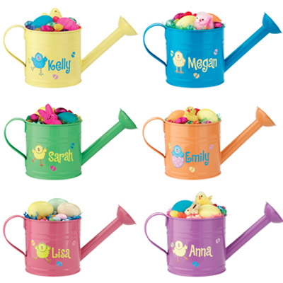 watering cans with easter eggs and toys