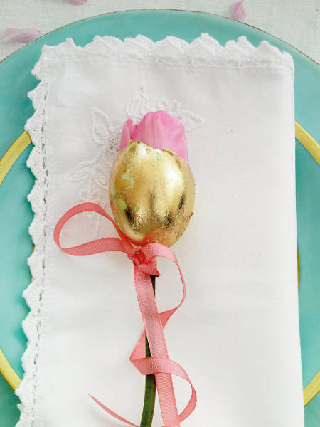 golden egg and white napkin
