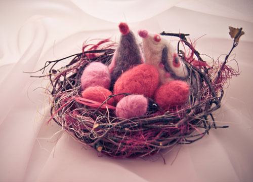 handmade nest with pink eggs and bird for easter decorating