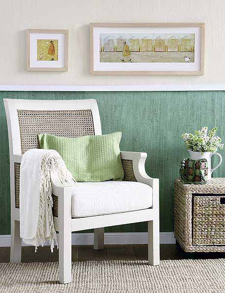 white chair with green pillow