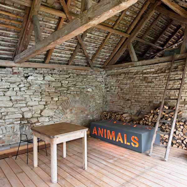 old wood ceiling design and stone walls