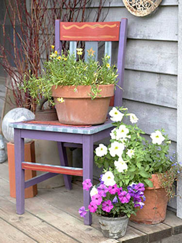 wood chair with flowers for backyard decoraitng