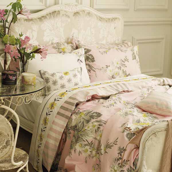 pink bedding set with white flowers