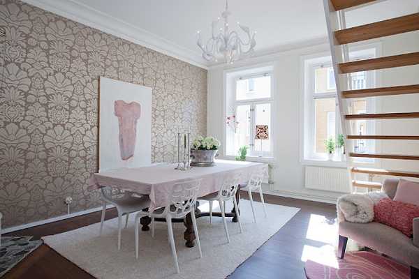 antique dining table and modern wallpaper with floral pattern