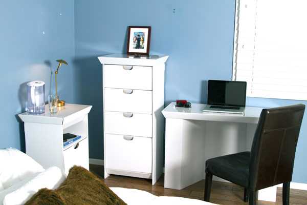 white storage cabinet with cardboard drawers