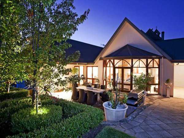 backyard design with stone patio