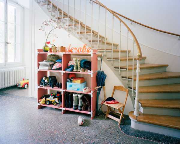 shelving unit under staircase