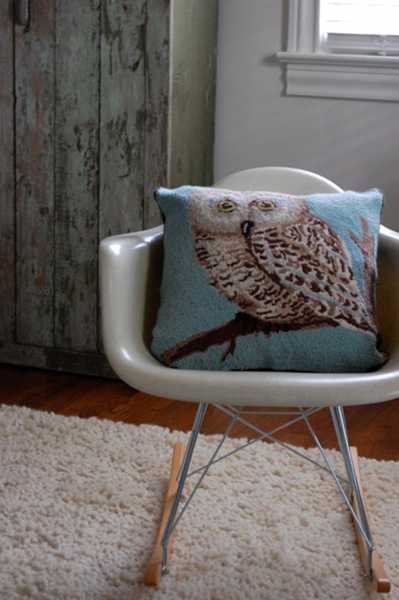 pillow with owl on pine twig