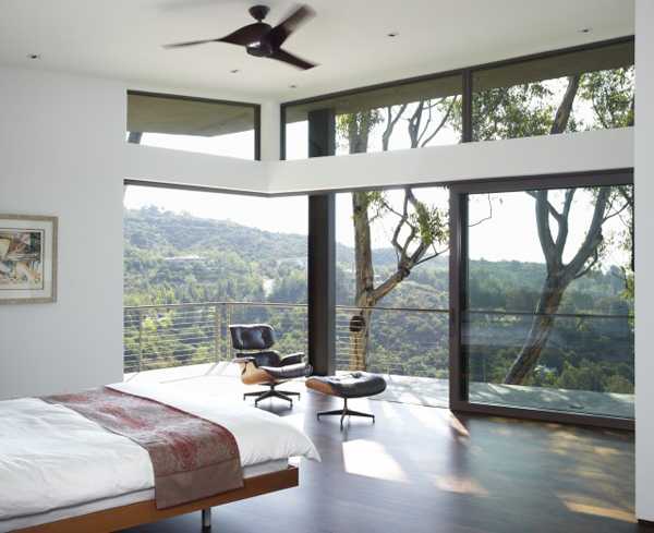 bedroom with glass door to terrace