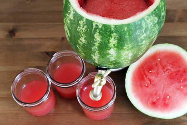 party table decoration with watermelon punch bowl