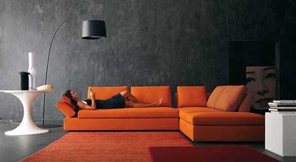 gray wall and living room sofa in orange color