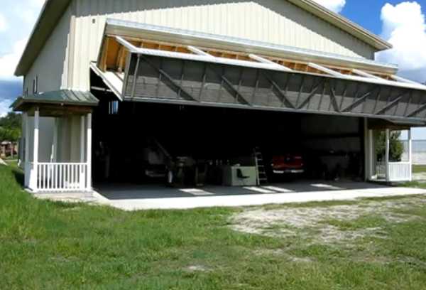 Hangar House Wall with Porch Turning into Lifted Garage Door