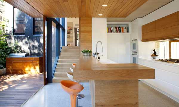 wood kitchen island and wooden ceiling design