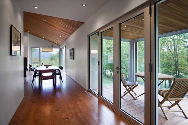 modern house with glass balcony enclosure