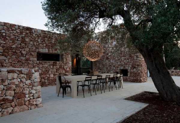 stone walls and patio furniture