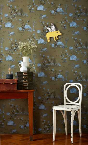 green wallpaper with blue details and colorful magnets