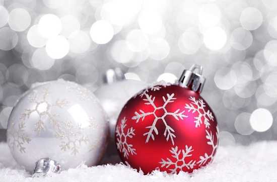 white and red christmas balls with snowflakes