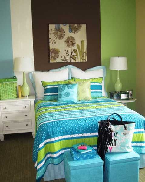 blue and green bedding set, white bedroom furniture and green wall