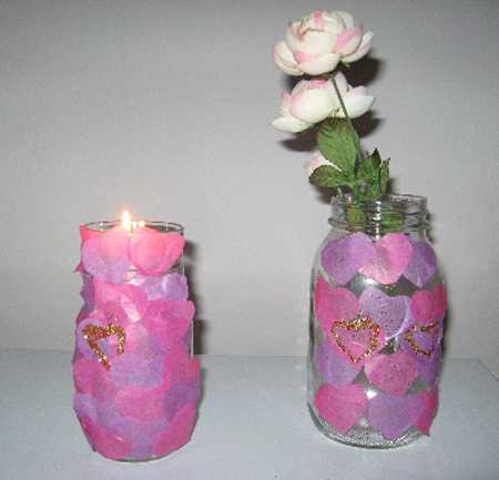 pink hearts vase with flowers and candle holder