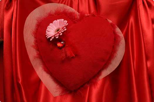 red heart decoration with pink flower