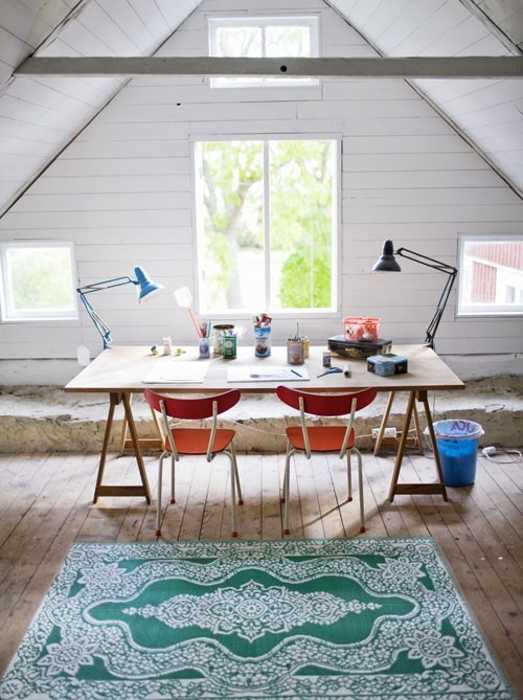 office design for two with bright chairs and floor rug