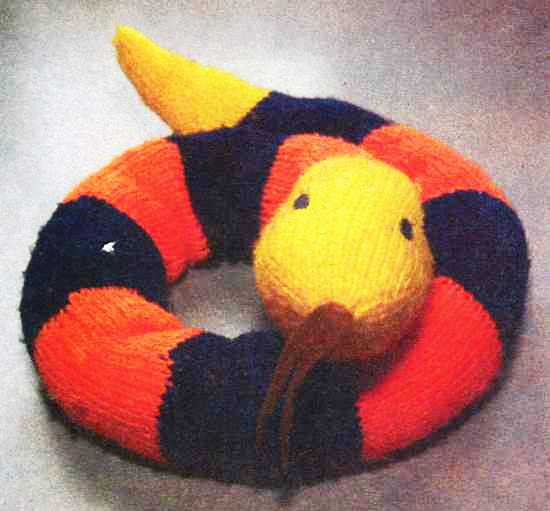 knitted snake in black and orange colors, soft kids toys and home decorations