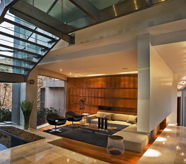 Luxurious Glass House with Impressive Glass Walls and Lighting Design