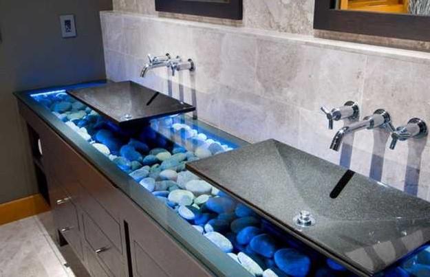 stone bathroom sinks and countertop with beach pebbles