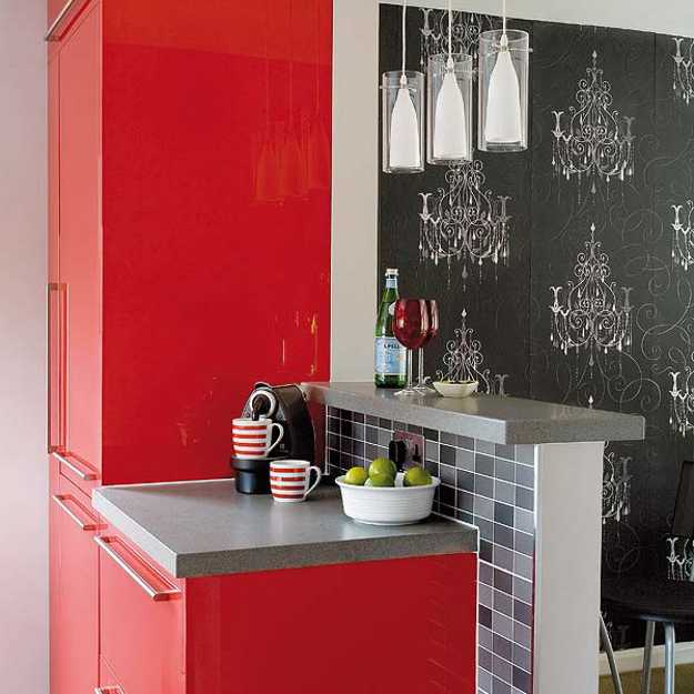 modern kitchen cabinets in red color and black wallpaper