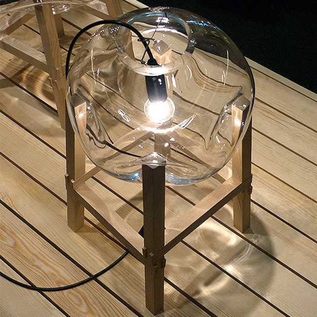 unique lighting fixture with wooden base