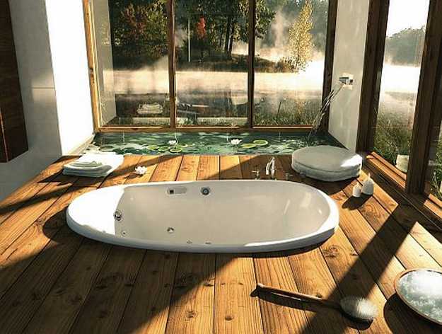 contemporary bathroom design with glass walls, water garden and built in floor bathtub