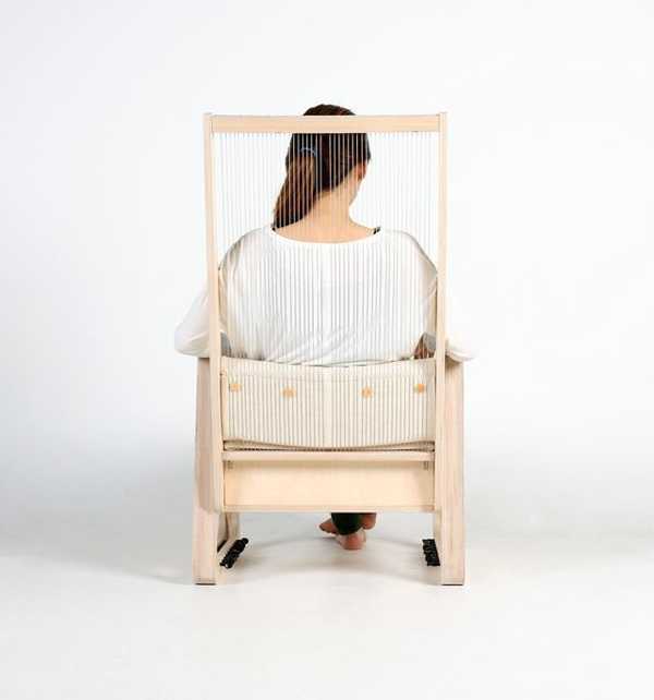 wooden chair with strings to play music
